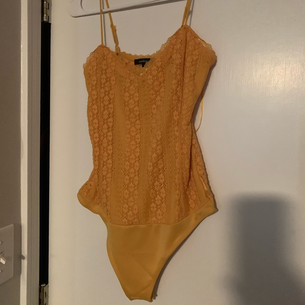 Yellow flower body suit